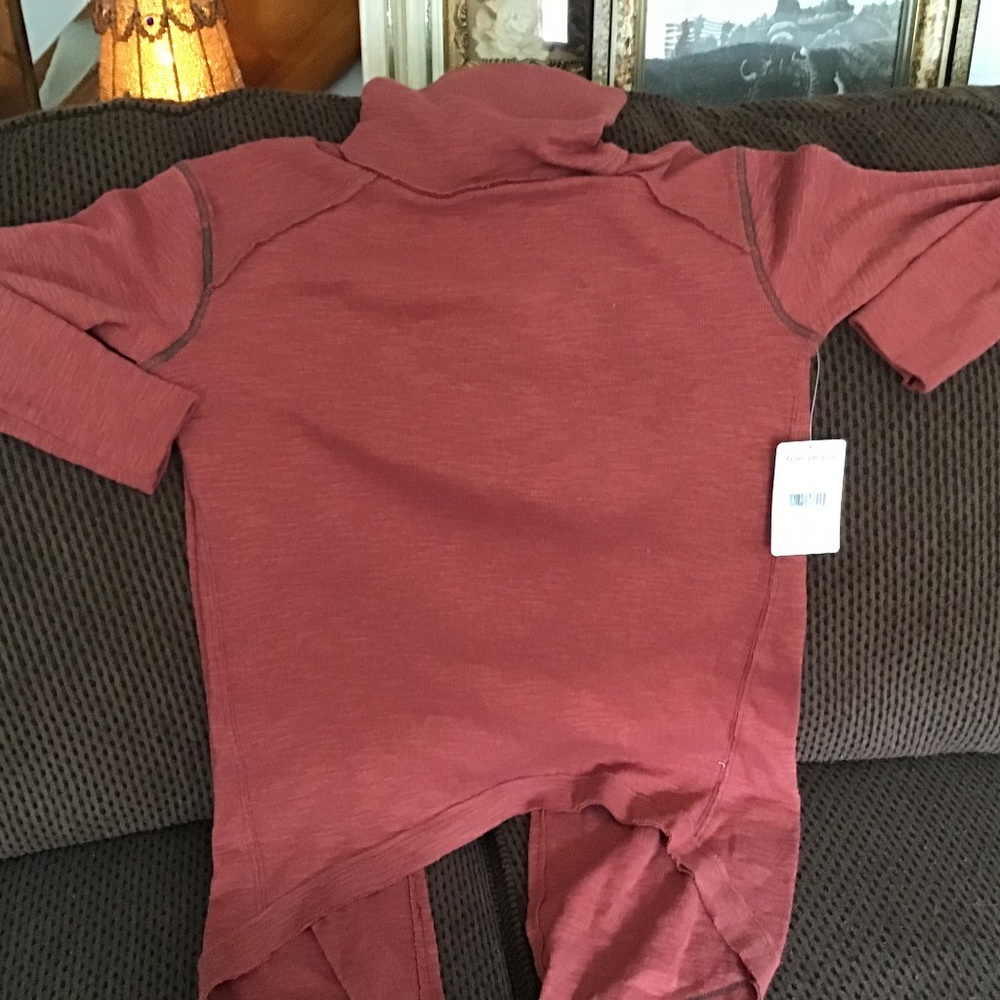 Free people Turtle neck split back! Brick color NEW large..